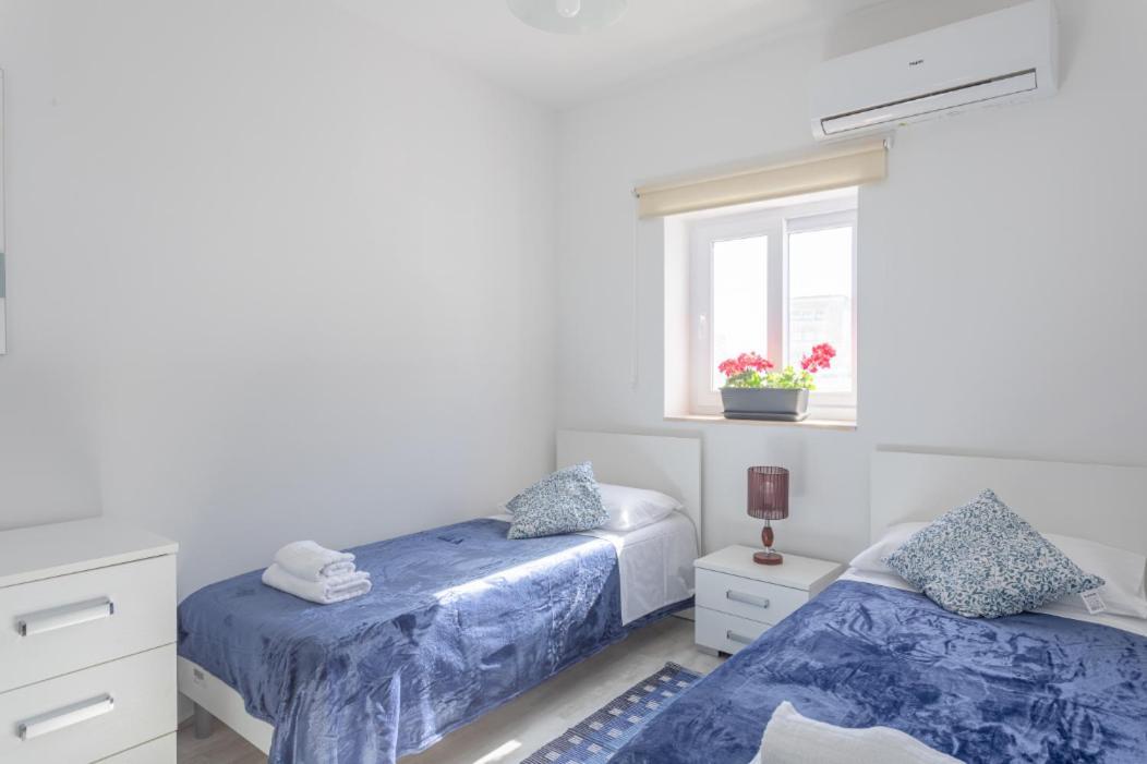 Accommodatie bij particulieren F3 3, Private Two Single Beds Shared Bathroom Msida